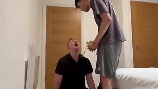 A master spits in his slave's mouth