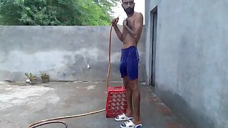 Pakistani villager bathing