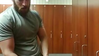 Bearded hunk eats his own load ar the gym locker room