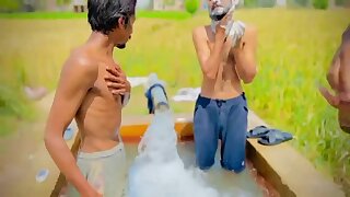 Tubewell boys playing and washing
