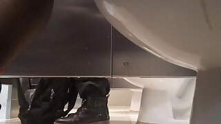 Another guy sat on the toilet to make a poop