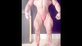 Young aesthetic amateur bodybuilder posing