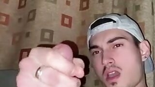 Hot college stud strikes his juicy cock and cums all over himself