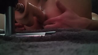 My fuck machine pounds my ass and makes it creamy.