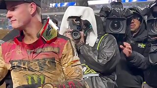Watch this motocross rider after a great race.