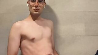 Small cock faggot jerks off in a public bathroom