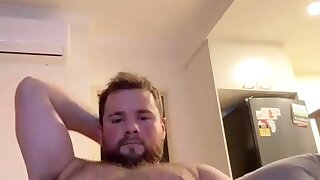 Hot view of hit cub playing with his dick