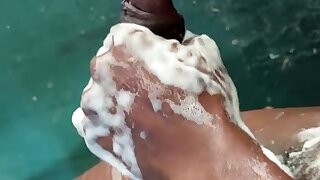 Uncut bigdicked dude bathing