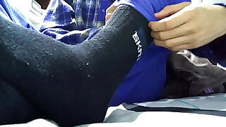 Playing with my black socks and barefeet before rest