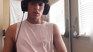 Hot Latino twink moans as he strokes his sexy cock and cums