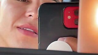 Hot Marine in his car showing off his good looks.