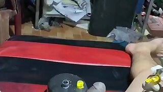 The big guy can’t keep his hairy cock from getting hard as it’s being covered with a tattoo.