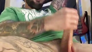 Tattooed dude lets loose