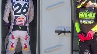 Motocross riders at track in gear.