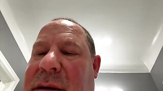 He jerks off one out and cums his load in the bathroom