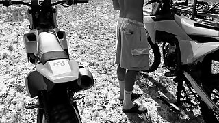 Watch this hot dude with his bike in motocross gear.