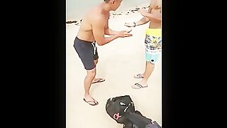 Applying oil on Singaporean hunk