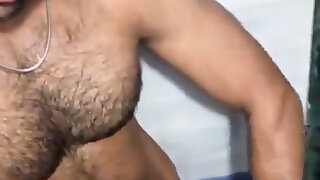 Hairy hunk stroking