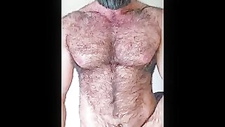 Hairy muscled hunk flexing pits and teasing